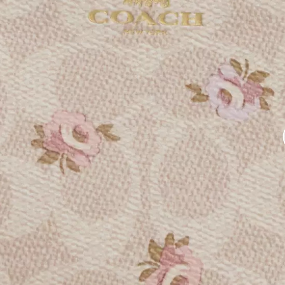 Coach Corner Zip Wristlet
In Signature Canvas With Floral Print NWT - Picture 4 of 5